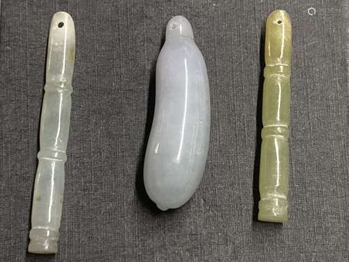 A Chinese jadeite gourd pendant, largest 43mm and two hardst...