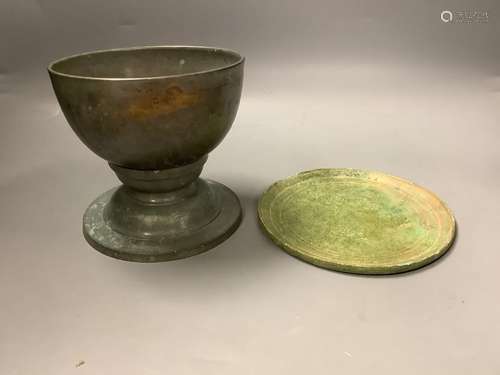 A Cambodian bronze ritual water bowl and stand and a similar...