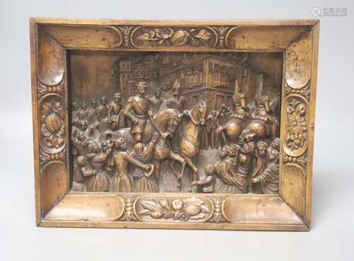 A 19th century Continental relief carved fruitwood plaque de...