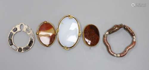 Four assorted base metal and chalcedony set brooches and a w...