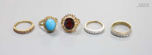 Five assorted modern 9ct gold and gem set rings including se...