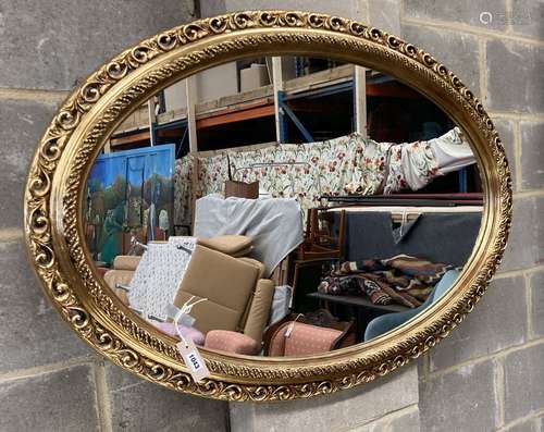 Two Victorian style oval gilt frame wall mirrors, larger 114...