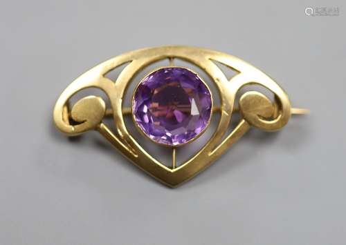 An early 20th century Art Nouveau yellow metal and amethyst ...