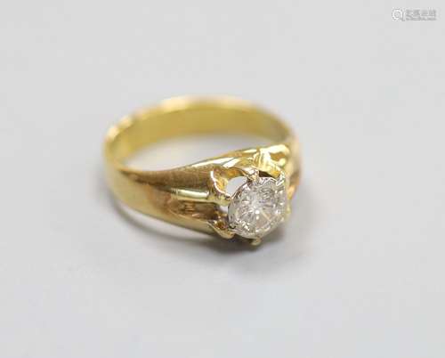 A yellow metal and illusion set solitaire diamond ring, size...