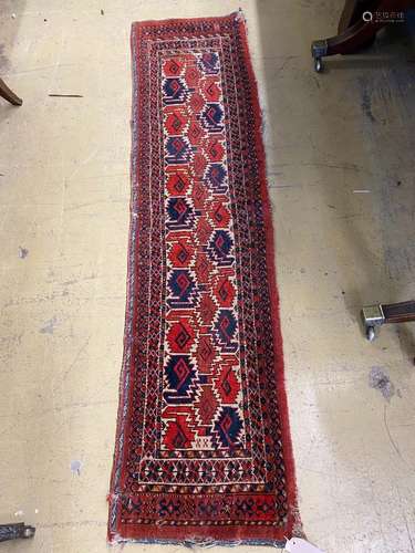 A North West Persian cream ground small rug, 39 x 159cm