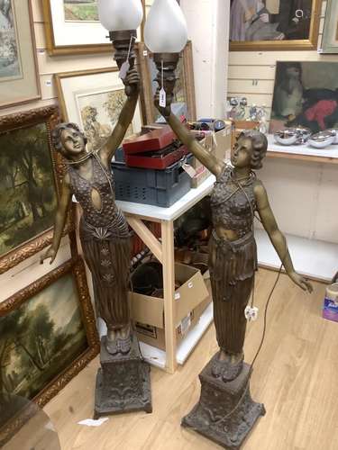 A large pair of figural Art Nouveau style torchere lamps, he...