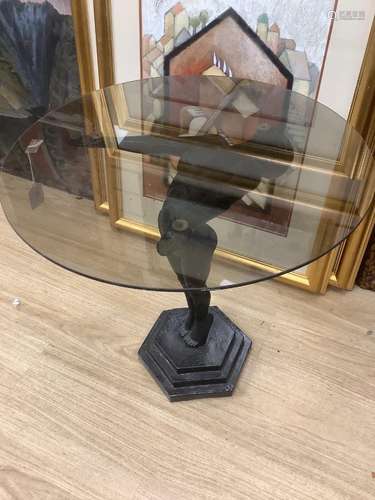 An Art Deco style occasional table with a figural metal fema...