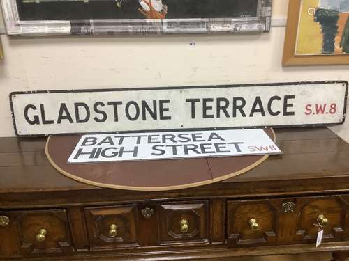 Two street signs, Gladstone Terrace SW8 and Battersea High S...