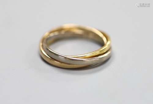 A modern three colour 18ct gold 'Russian' triple band weddin...