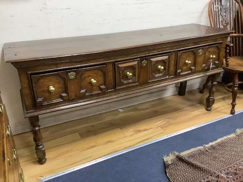 A Charles II oak dresser, fitted three drawers, with geometr...