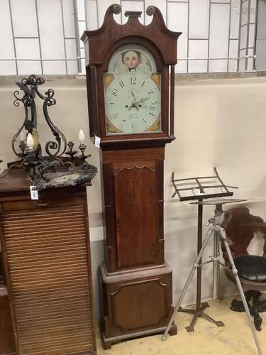 An early 19th century mahogany and oak eight day longcase cl...