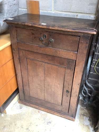 A 17th century Welsh oak single door cupboard, width 67cm, d...