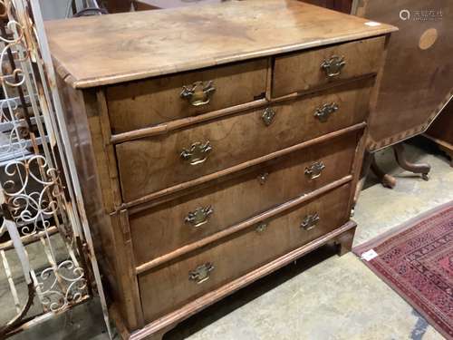 A William and Mary walnut and oak inlaid chest, in two parts...