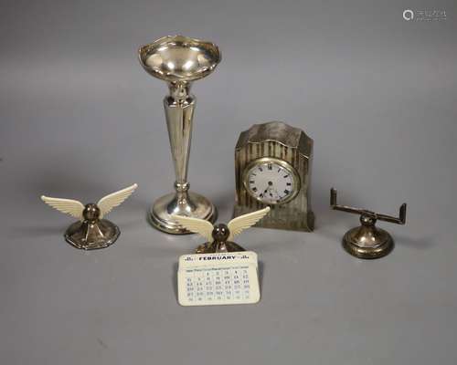 A George V silver cased bedside timepiece, a silver and ivor...