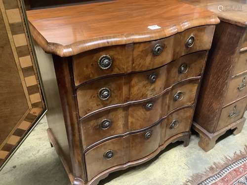 An 18th century Dutch walnut block fronted chest of four gra...