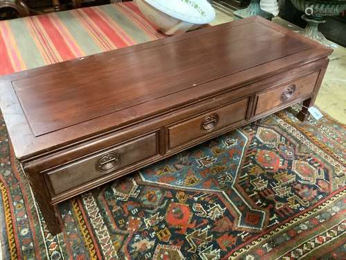 A Chinese hardwood rectangular three drawer coffee table, wi...