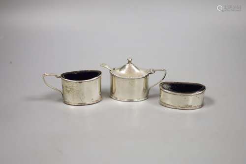 A George V silver three piece condiment set, Birmingham,1927...