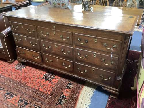 A late 18th century oak and mahogany crossbanded mule chest,...