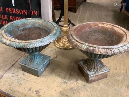 A pair of Victorian cast iron campana garden urns, 54cm diam...