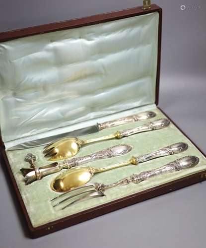 A cased early 20th century French five piece parcel gilt whi...