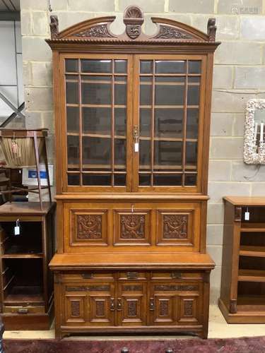 A large Victorian oak secretaire bookcase, width 144cm, dept...