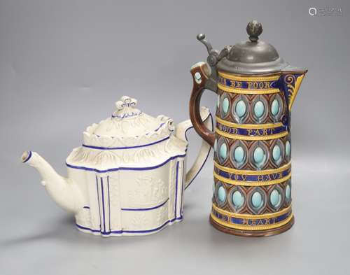 A Wedgwood majolica motto jug, 27cm high and a Regency white...