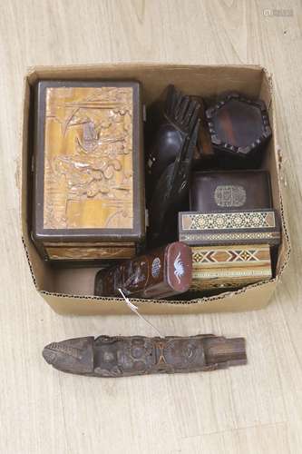 A quantity of Chinese and other carved wood boxes and wood c...