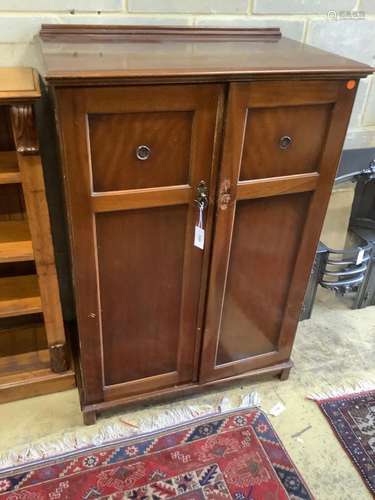 An Edwardian mahogany two door compactumAn Edwardian mahogan...