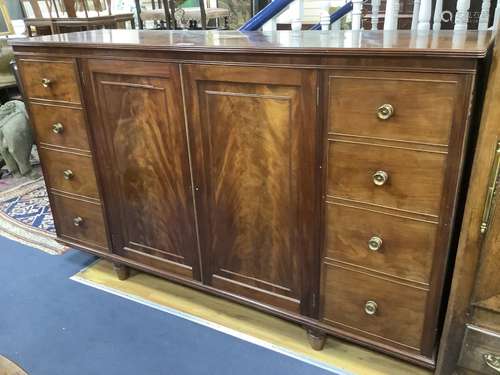 A Regency mahogany press cupboard,with reeded rectangular to...