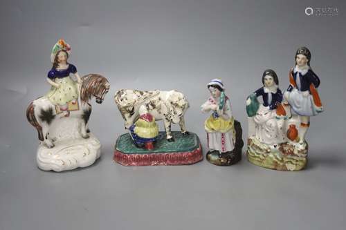 A North Country pearlware milkmaid group, c.1820, two Staffo...