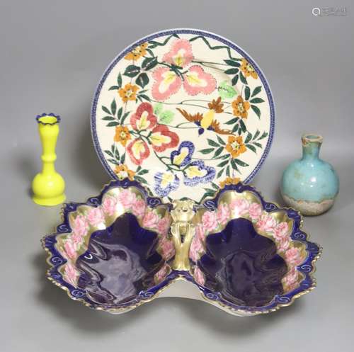 A twin section porcelain basket, two studios vases and a pla...