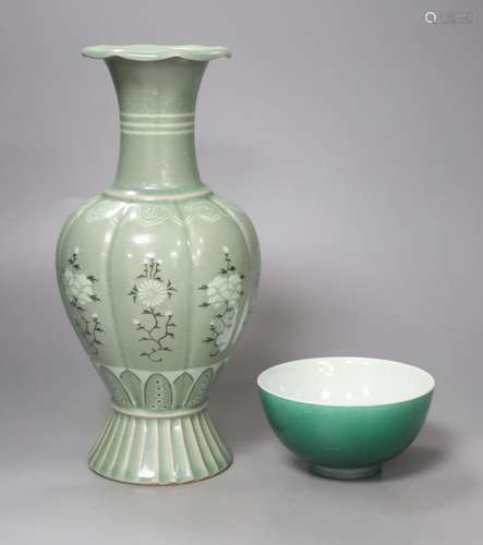 A Chinese green glazed bowl and a Korean celadon vase, heigh...