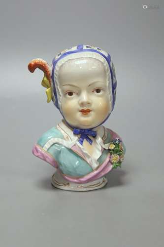 After J.J. Kandler. A Dresden porcelain bust of a child, 14....