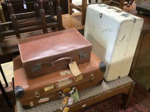 Four assorted vintage suitcases