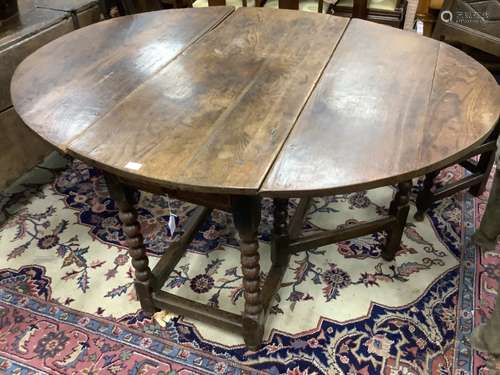 A six-seater oak gateleg dining table, late 17th century, 14...