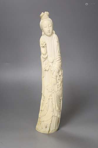 A Chinese ivory carving of a He Xiangu, early 20th century, ...