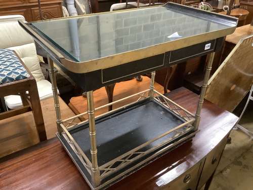 An ebonised brass and lacquer drinks trolley, width 77cm, de...