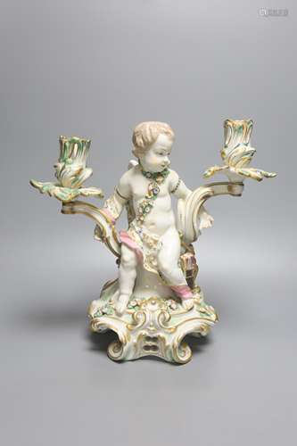 A large German porcelain 'Cupid' candelabrum, late 19th cent...