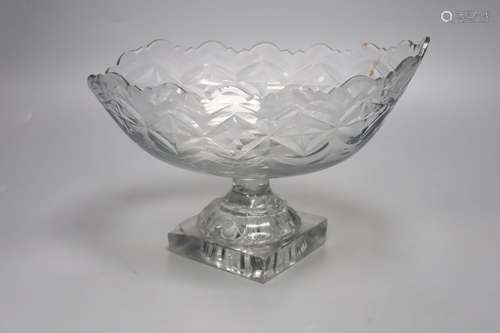 A George III Irish oval cut glass fruit bowl, lemon squeezer...