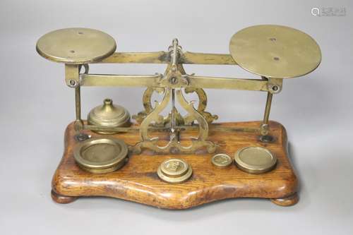 A set of brass postage scales