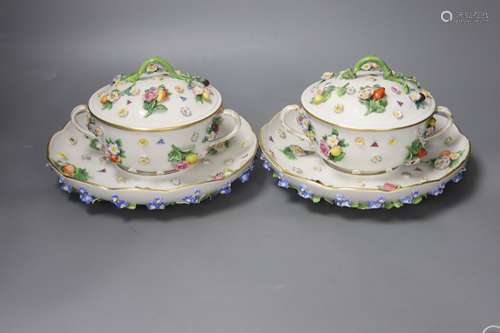 A pair of 19th century Meissen two handled ecuelles and cove...