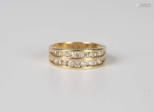 An 18ct gold and diamond ring, mounted with two rows of circ...