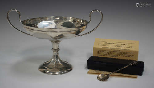 A George V silver two-handled comport, the circular bowl fla...