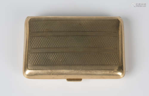 A 9ct gold rectangular cigarette case with engine turned dec...