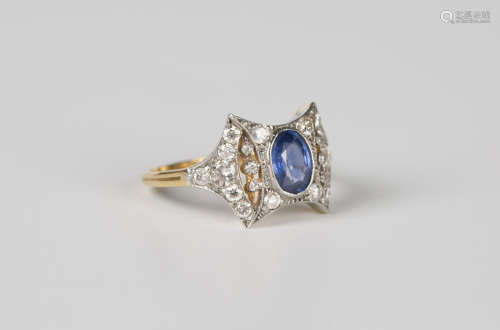 A gold, sapphire and diamond ring in an Art Deco inspired de...