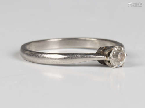 A diamond single stone ring, claw set with a cushion cut dia...