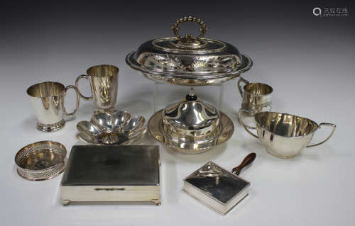 A collection of plated items, including an entrée dish, cove...