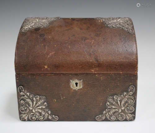 A late Victorian silver mounted brown leather stationery box...