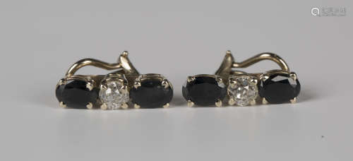 A pair of gold, sapphire and diamond three stone earclips, e...