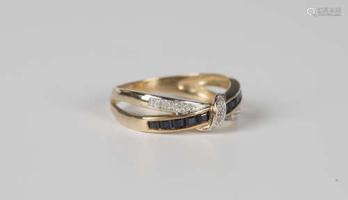 A 9ct gold, sapphire and diamond ring, mounted with rows of ...